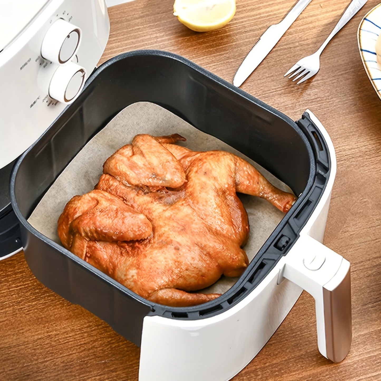 Get a pack of 50 or 100 disposable air fryer liners with holes, available in two sizes (16.99cm and 19.0cm). These air fryer parchment papers are perfect for your oven accessories, baking tools, kitchen gadgets, and other home kitchen items.