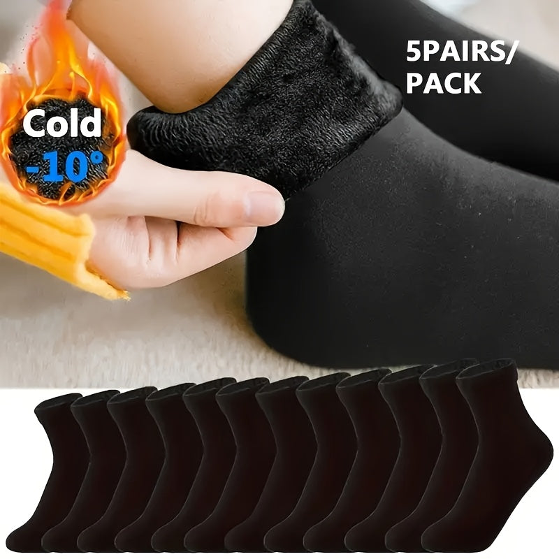 5 pairs of cozy mid-calf boot socks made of soft, breathable, elastic polyester for cold weather comfort.