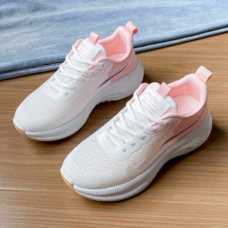 Women's low-top running shoes in white with orange sole, breathable fabric upper, rubber sole, stabilizing support, all-season casual sneakers.