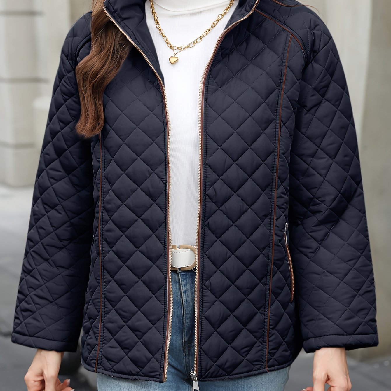 Women's plus size quilted jacket with zipper closure, polyester material, long sleeves, solid color, autumn/winter outerwear.