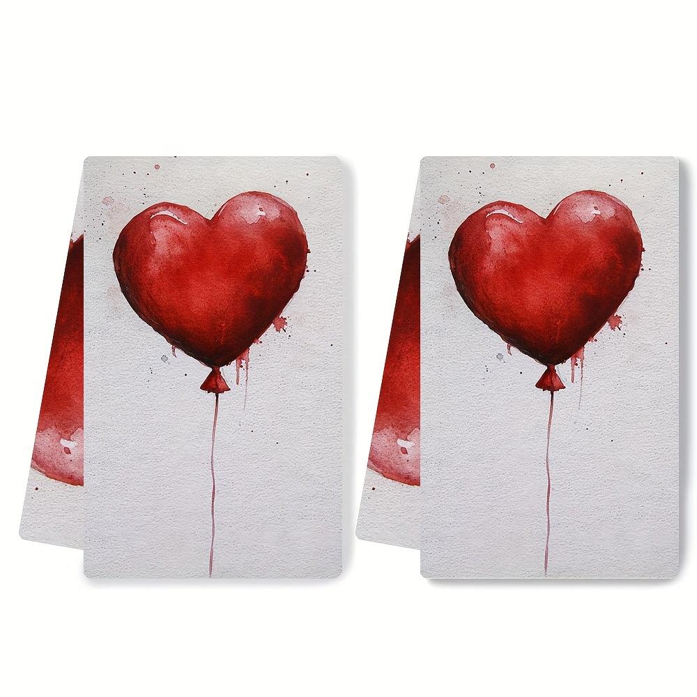 Two pieces of ultra soft kitchen towels featuring a Valentine's heart balloon design. These highly absorbent and machine washable dish hand towels are contemporary red on white decor and measure 40.64x60.96 cm. A must-have addition to your kitchen!