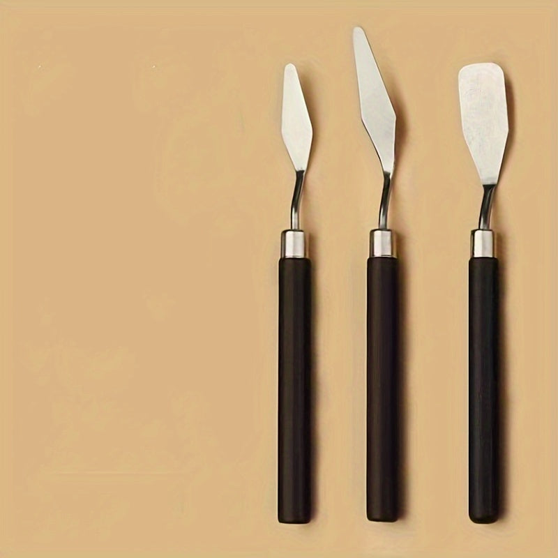 Set of stainless steel palette knives for oil painting, available in various sizes and shapes.