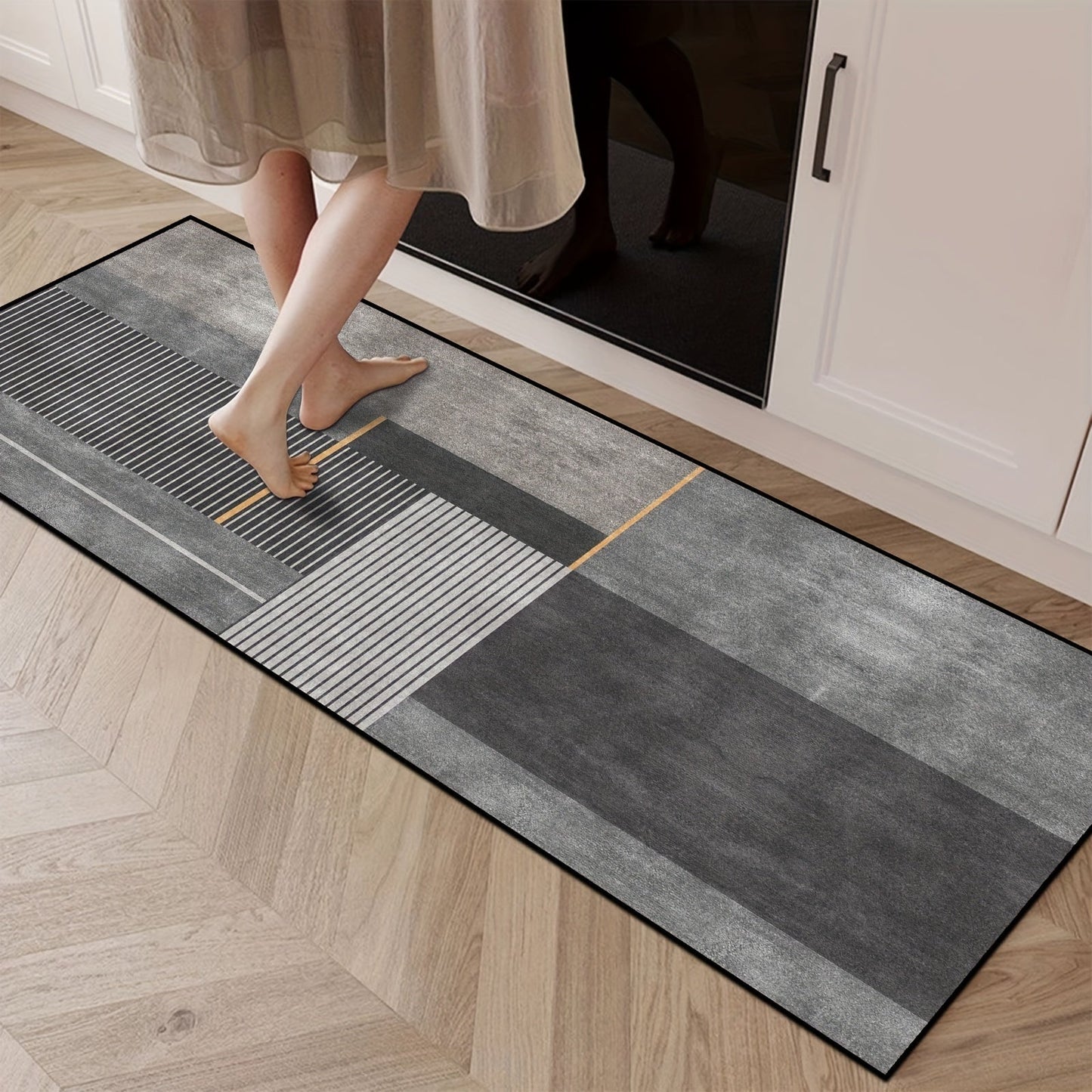 One piece of modern absorbent floor mat that is anti-fatigue and oil-proof, suitable for use in the kitchen. This non-slip kitchen rug is waterproof and can be used as a runner rug or standing desk mat. Perfect for use in the house, sink, office, or