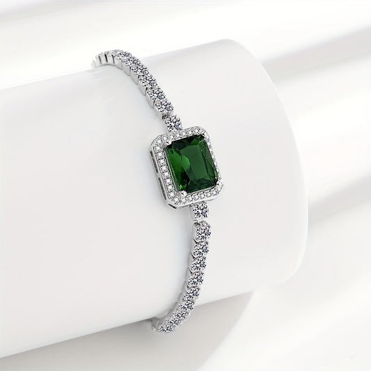 An elegant and luxurious women's bracelet featuring dazzling green Zirconia stones, crafted in adjustable 925 silver weighing just 4.3g. Perfect for daily wear, special occasions, and gifting, especially for Middle Eastern events.