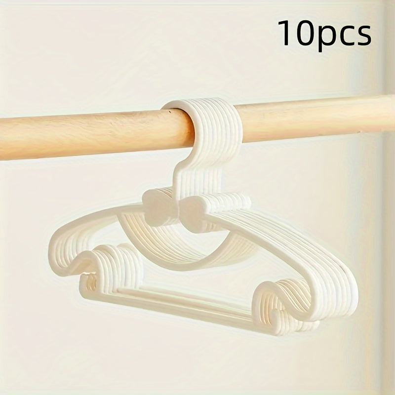 10-piece set of sturdy plastic hangers for kids' clothing - features anti-slip design and space-saving storage solution for children's wardrobes and dorm rooms.