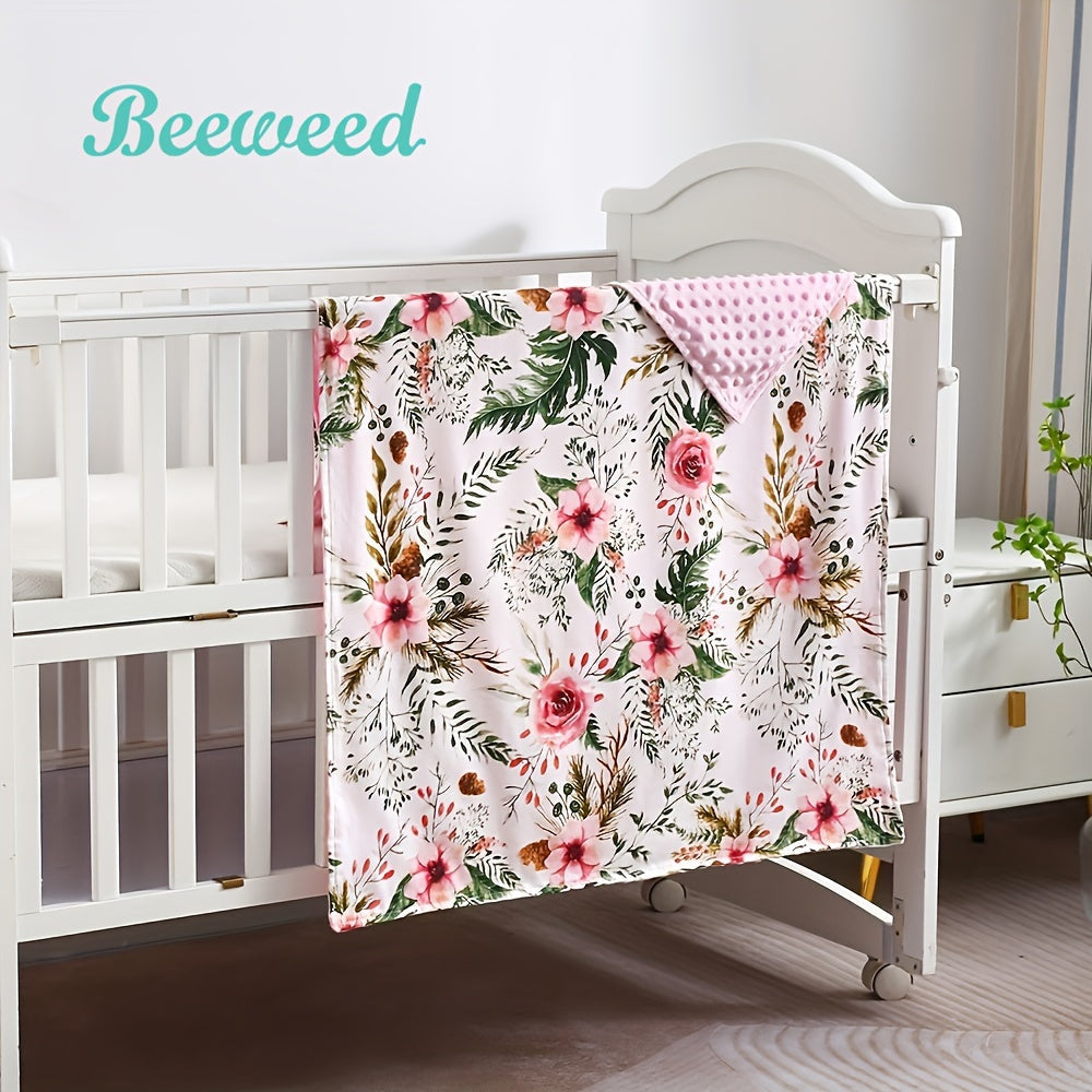 Baby blanket for boys and girls measuring 76.2 x 101.6 cm. This soft plush minky blanket features a dotted backing and a lovely flower double layer design, perfect for strollers and cribs.