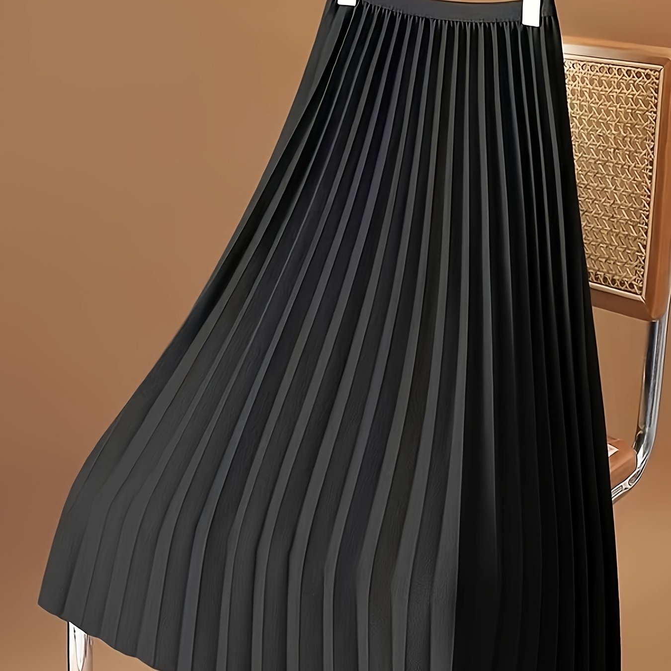 Stylish pleated midi skirt for spring and summer, women's fashion.