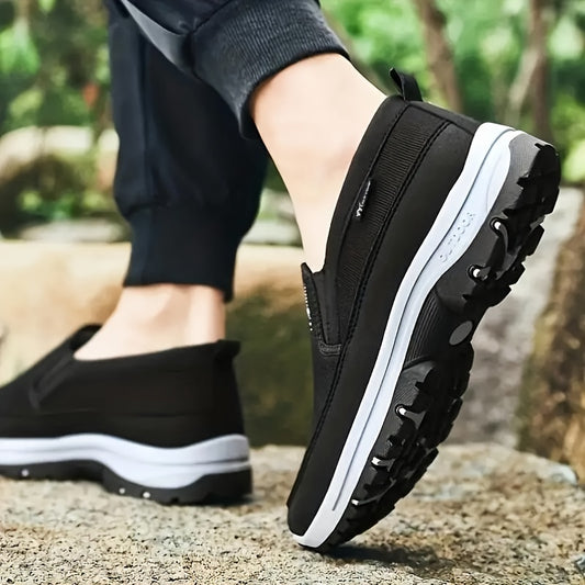 Comfortable men's slip-on sneakers with soft sole, breathable fabric, and stylish design for everyday wear.