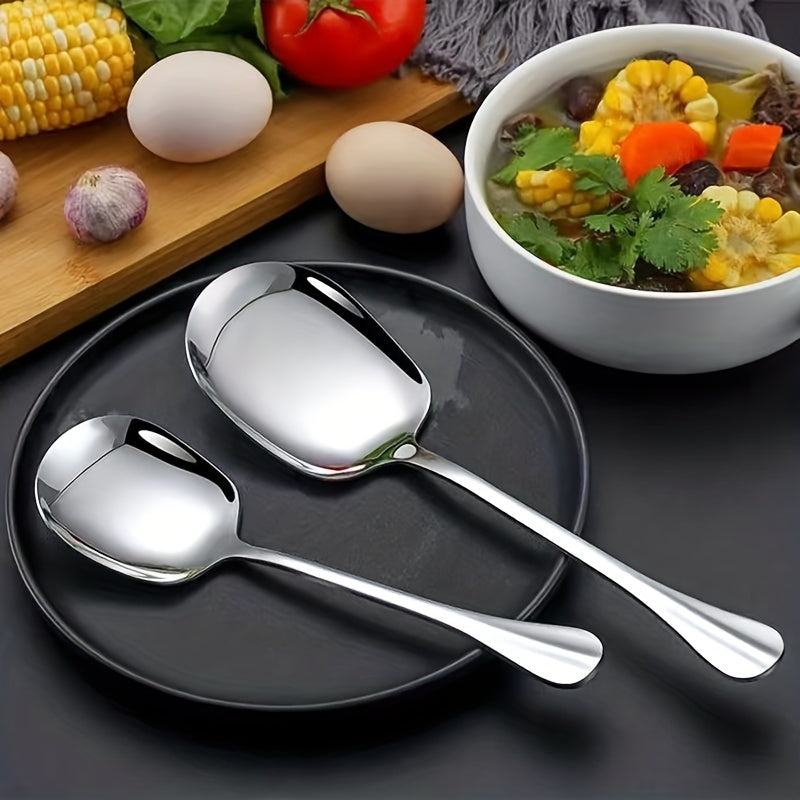 2 pieces of stainless steel serving spoons for catering events and parties.