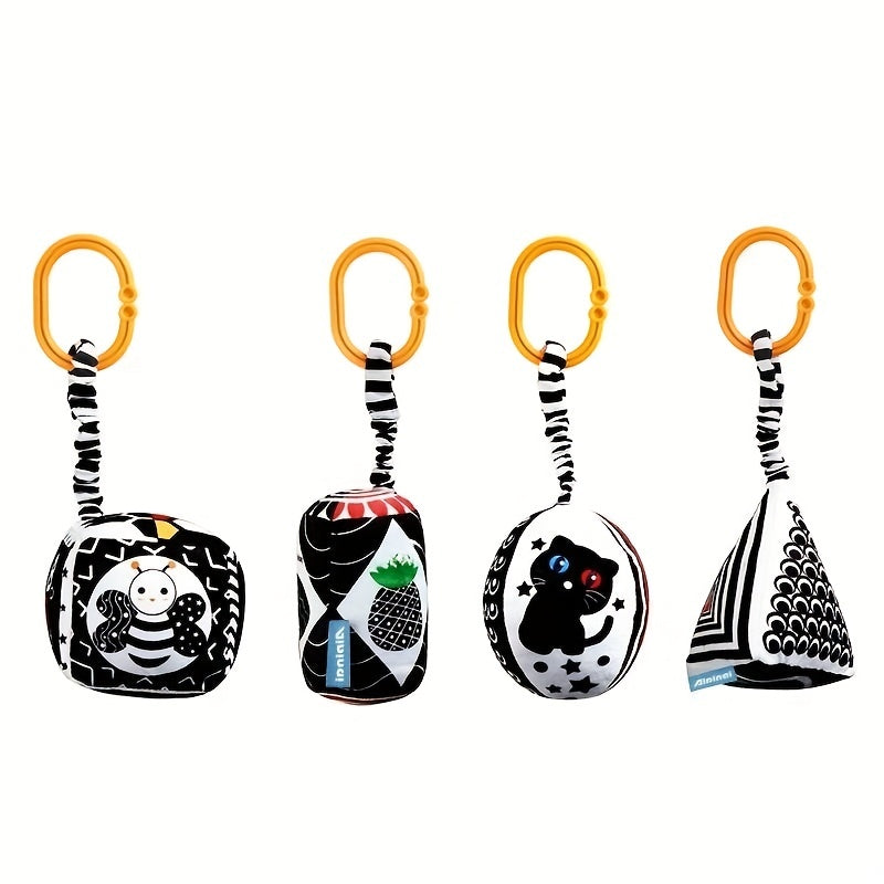 Geometric-shaped black and white hanging toys for babies, designed for early education and visual stimulation. Perfect for attaching to strollers, car seats, or hanging over baby's bed.