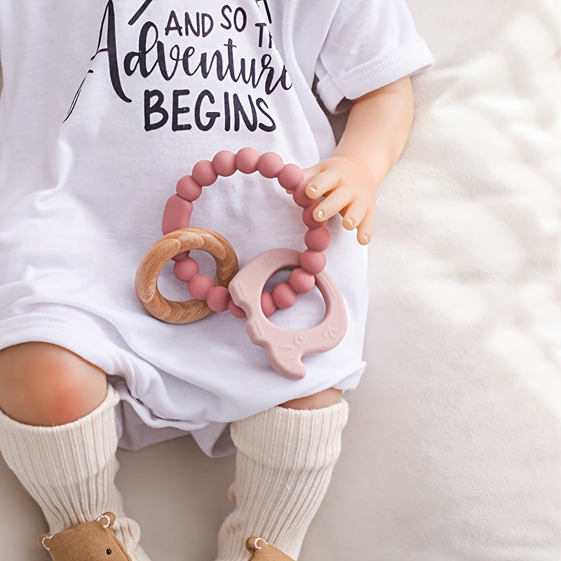 Elephant-shaped baby chewing toy with a soothing molar teether, made free from BPA, phthalates, chlorine, and latex.