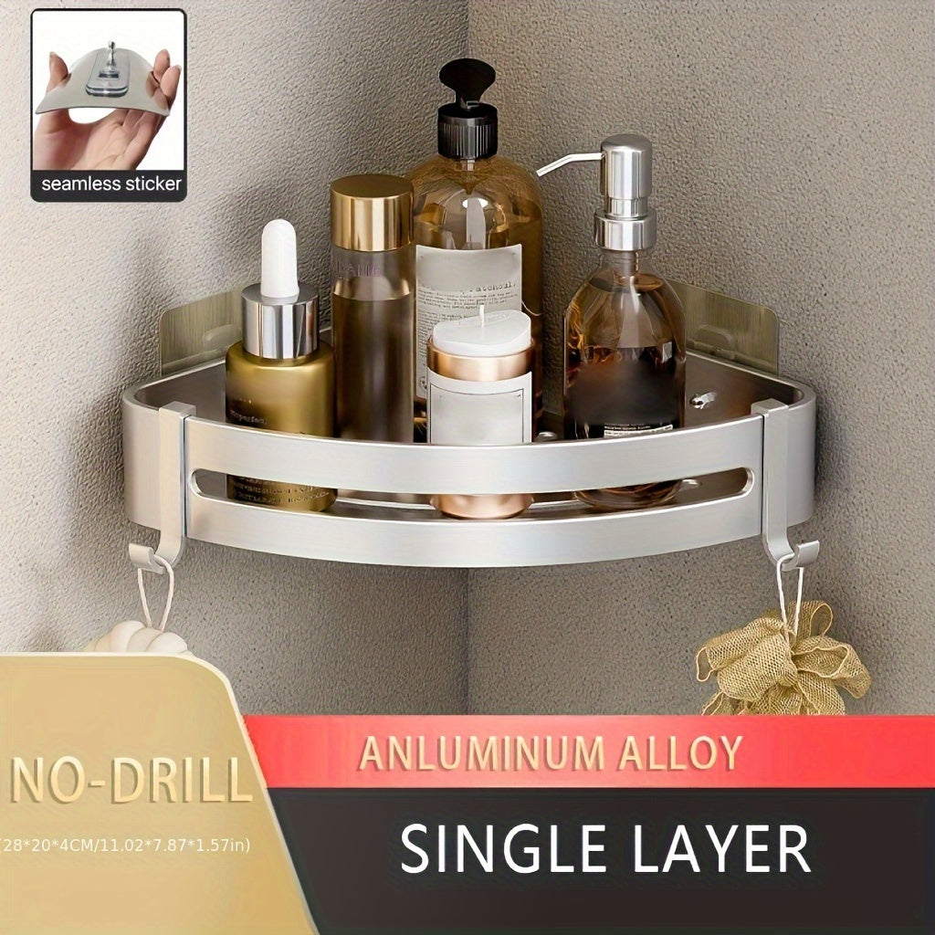 Wall-mounted bathroom storage rack for shampoo, shower gel, and cosmetics; made of space aluminum with no need for drilling.