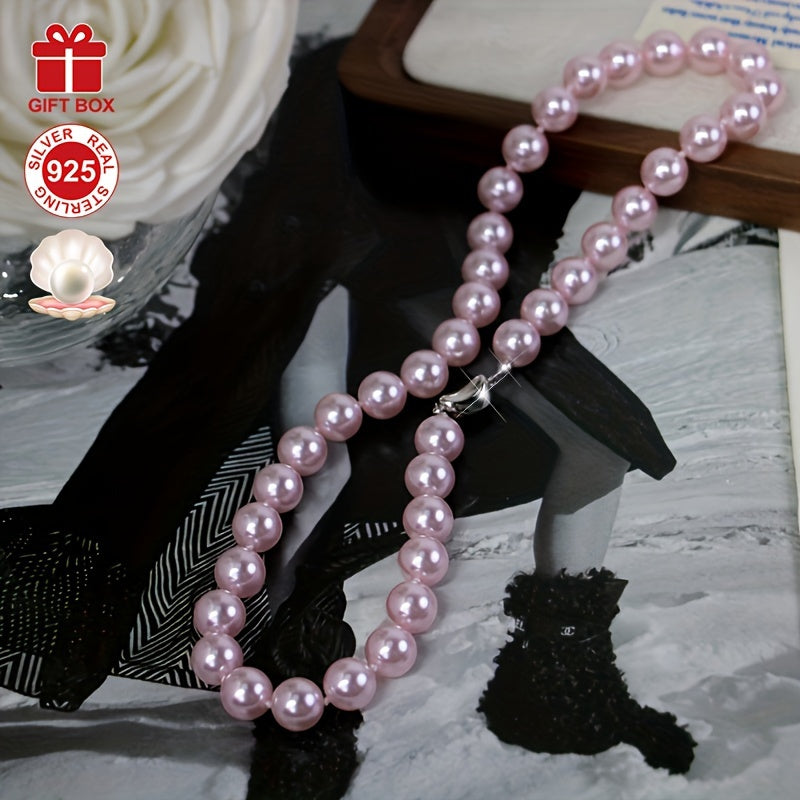 This stunning Cherry Blossom Pink Shell Pearl Necklace is crafted with hypoallergenic 925 Sterling Silver and features a vintage charm clasp. It makes the perfect gift for her and comes beautifully presented in an elegant gift box, making it ideal for