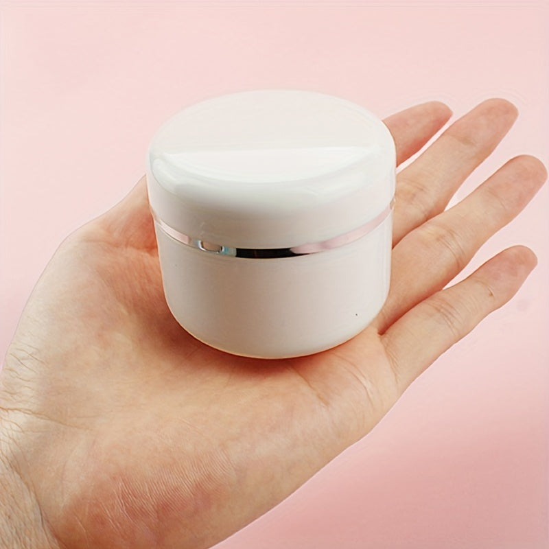 20pcs of 20ml white plastic cream jars are refillable sample bottles for cosmetics, makeup, and skincare, ideal for travel and storage.