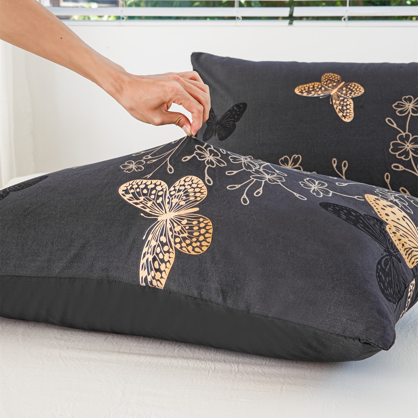 Choose from multiple sizes of these soft and comfortable polyester pillowcases, featuring a golden butterfly print. Perfect for adding a touch of elegance to your bedroom decor.