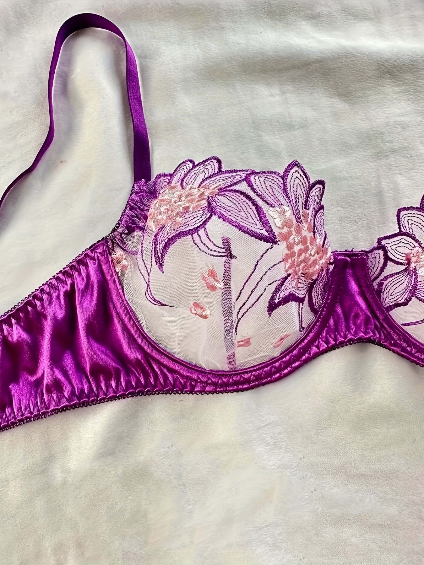 Floral embroidered sheer lingerie set with low cup non-padded bra and G-strings for women.