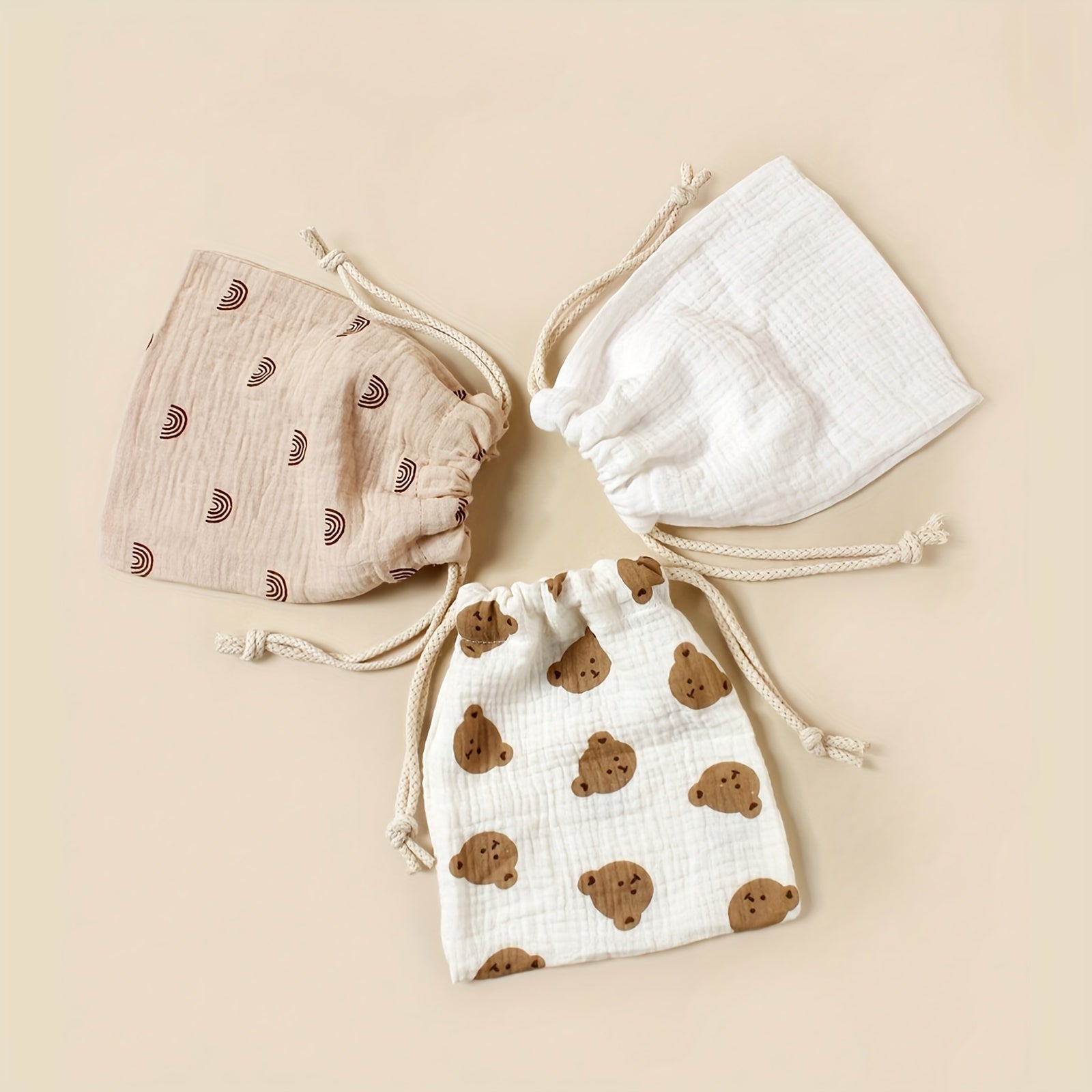 Three drawstring storage bags with printed patterns for home and travel, ideal for stroller accessories and personal items. These dust-proof organizers are suitable for individuals aged 14 and up.