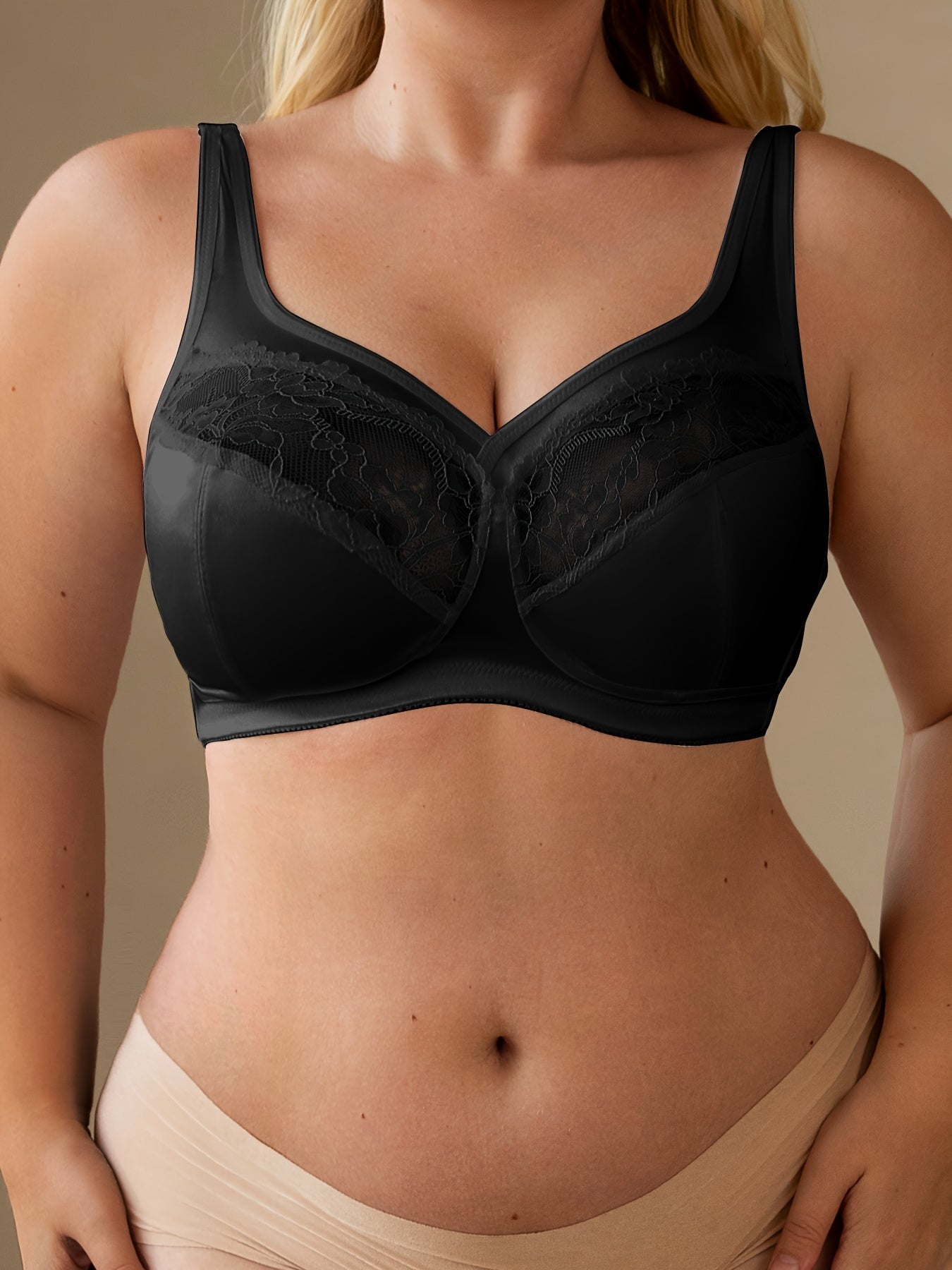 Stylish lace-trimmed tank bra for plus-size women - non-padded cups, breathable fabric, and sexy underwire design.