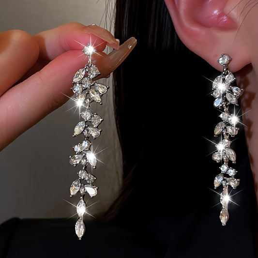 A chic and fashionable pair of long tassel earrings adorned with synthetic zirconia, crafted from high-quality 925 silver (approximately 20g). Perfect for gifting to girlfriends and friends.