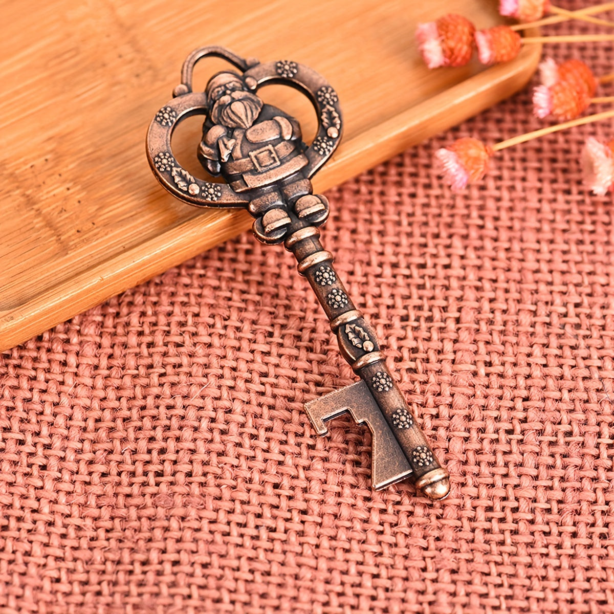 Antique bronze Santa Claus key-shaped bottle opener doubles as a Christmas tree ornament and keychain gift.