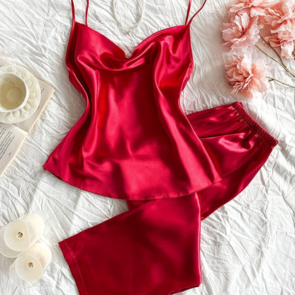 Solid satin pajama set with a sexy cowl neck, backless cami top, and relaxed fit pants for women.