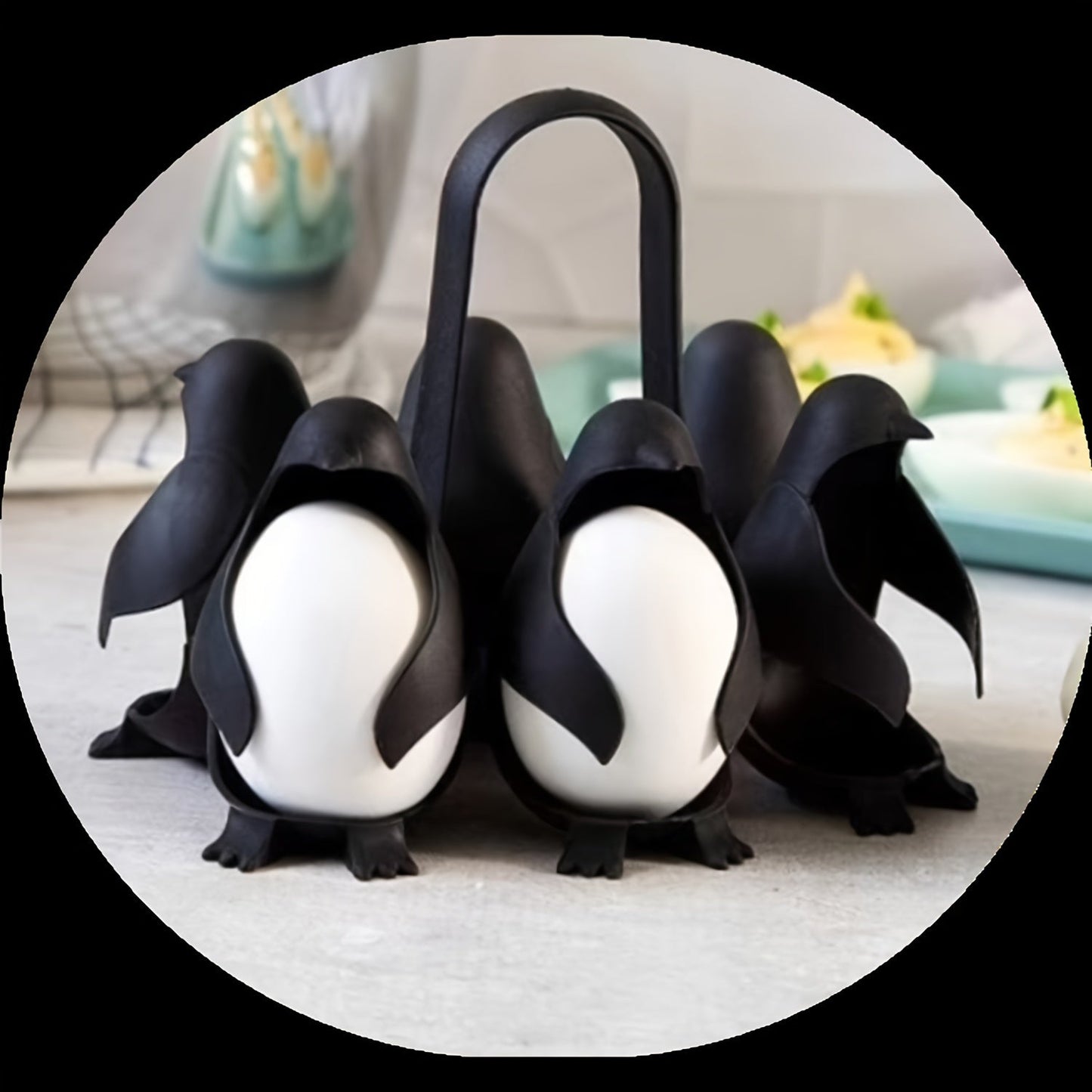 A set of 6 Penguin Egg Cookers made of plastic, perfect for boiling both hard and soft eggs. This food-safe kitchen gadget is a great gift idea for Christmas, Thanksgiving, Mother's Day, and Labor Day.