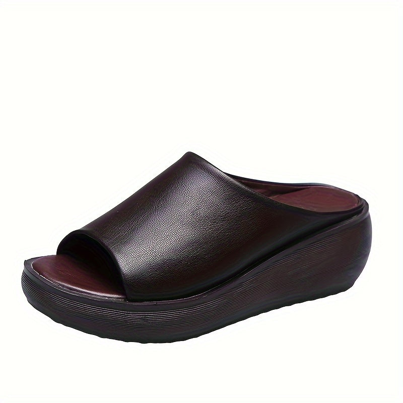 Stylish and comfortable women's wedge slides with open toe and soft sole, perfect for vacations.