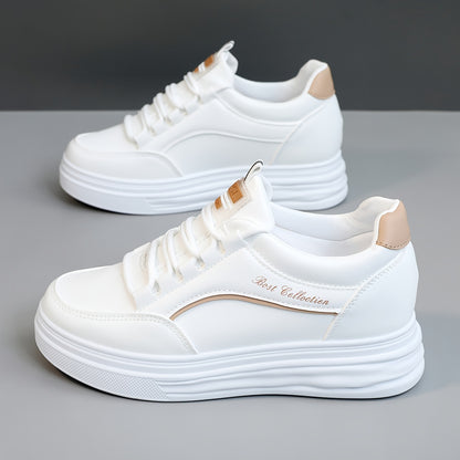 White lace-up sneakers with thick soles, perfect for casual wear.