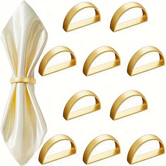 6 golden stainless steel napkin rings for elegant table decor during Christmas and special occasions.