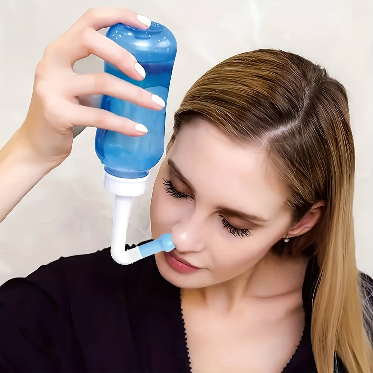 Nasal wash bottle for sinus relief and nose care, includes neti pot for nasal irrigation. BPA-free and ideal for those suffering from rhinitis, allergies, colds, and flu. Available in 300ml or 500ml sizes.