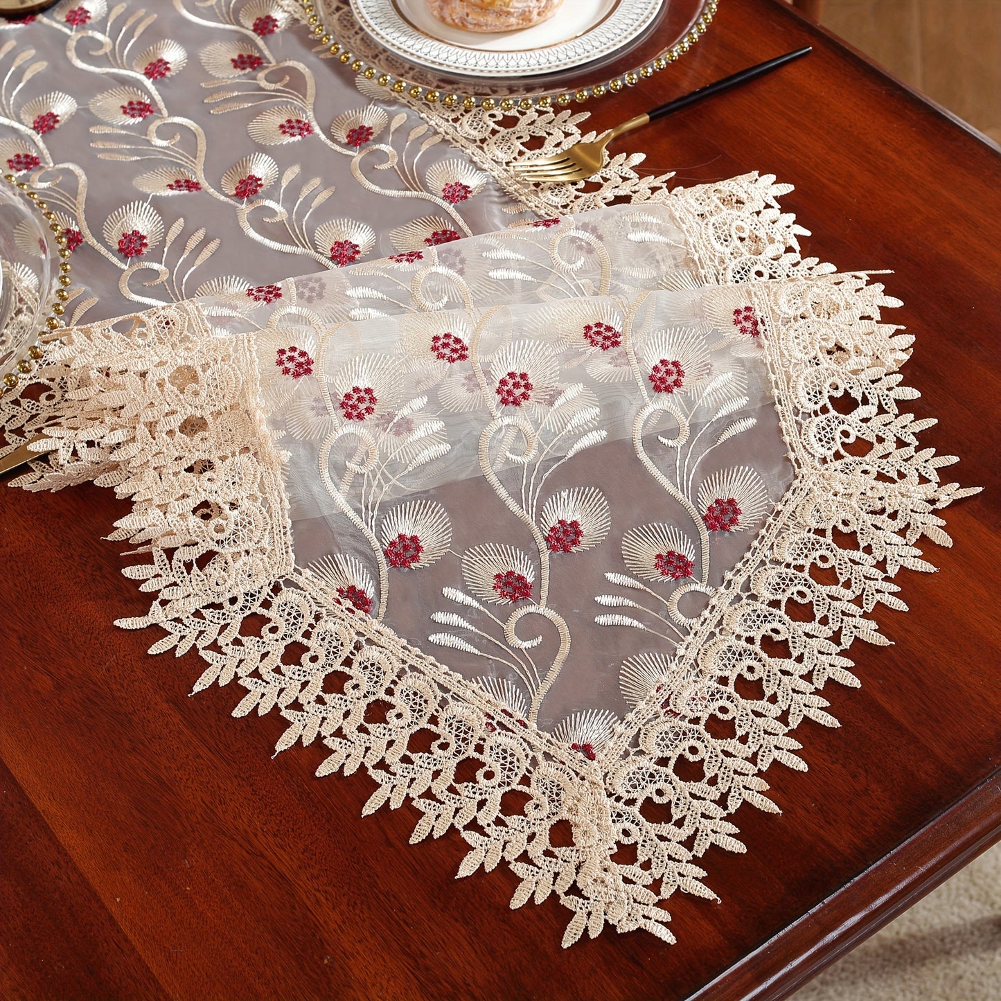 Polyester embroidered table runner for holiday and wedding decor.