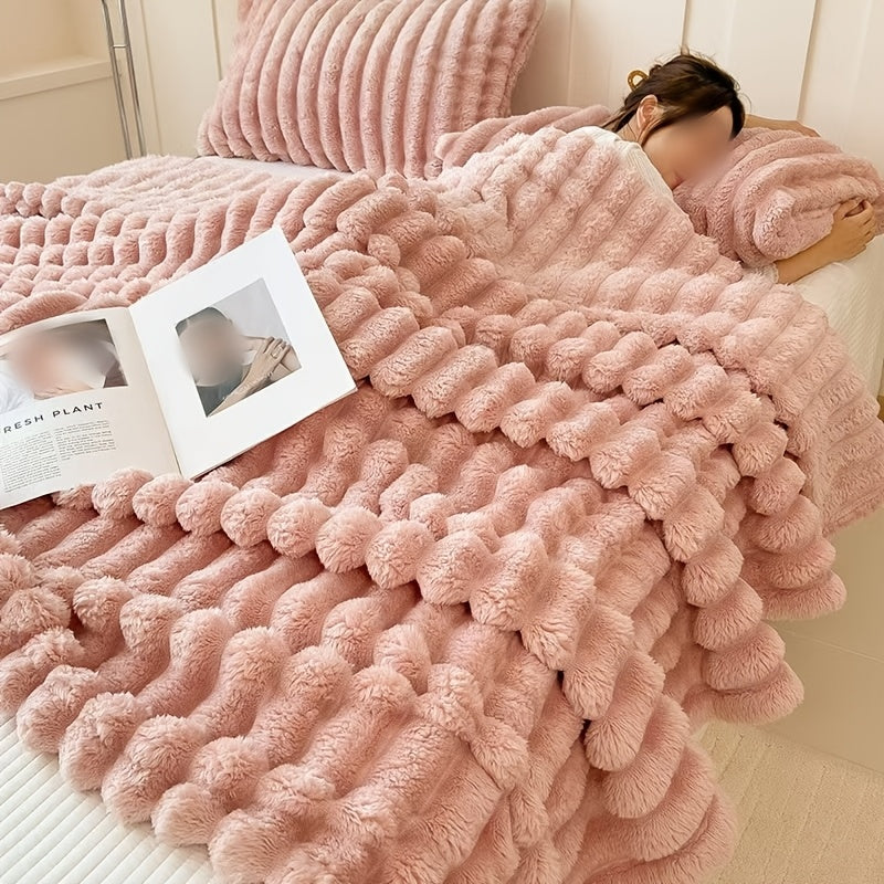 Indulge in the comfort of our luxurious plush blanket - a cozy fleece throw that will keep you warm and snuggled up on the sofa. This soft and insulating blanket is not only perfect for lounging, but also machine washable for easy care. Its modern style