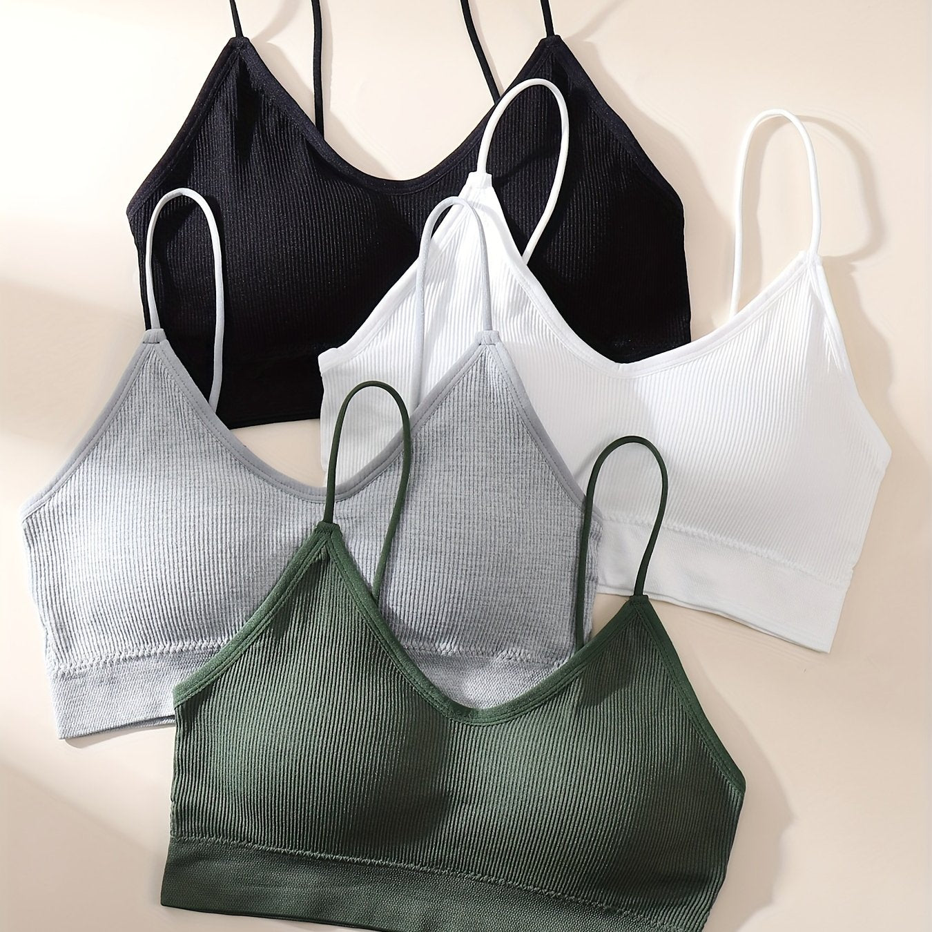 Set of 4 wireless ribbed bras for women, simple and comfortable intimate lingerie.