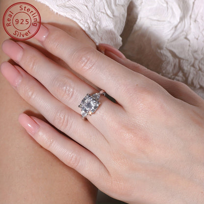 This stunning engagement ring features an elegant design with sparkling 3-stone synthetic cubic zirconia in square and triangle shapes. Made from 925 sterling silver with a high-polished finish, this ring is perfect for weddings and anniversaries. It