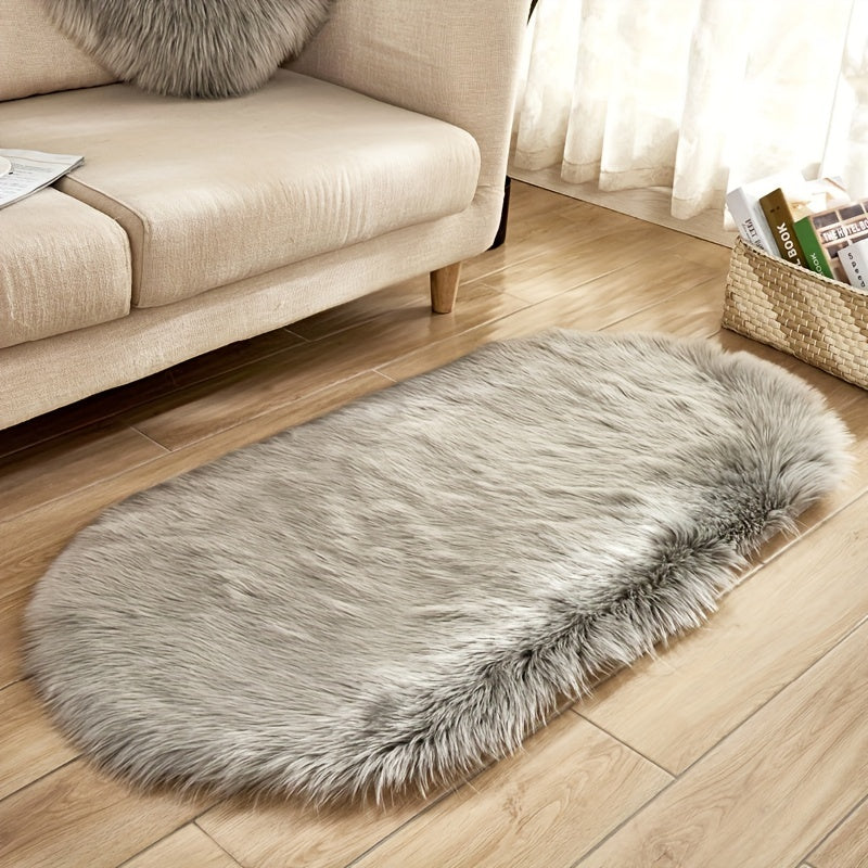 One piece of a luxurious Super Soft Area Rug, featuring a Plush Fluffy Faux Sheepskin design in an Oval shape, perfect for adding warmth to your Living Room or Bedroom. This Machine Washable Bedside Rug is made of Shaggy Plush Carpet Faux material, ideal