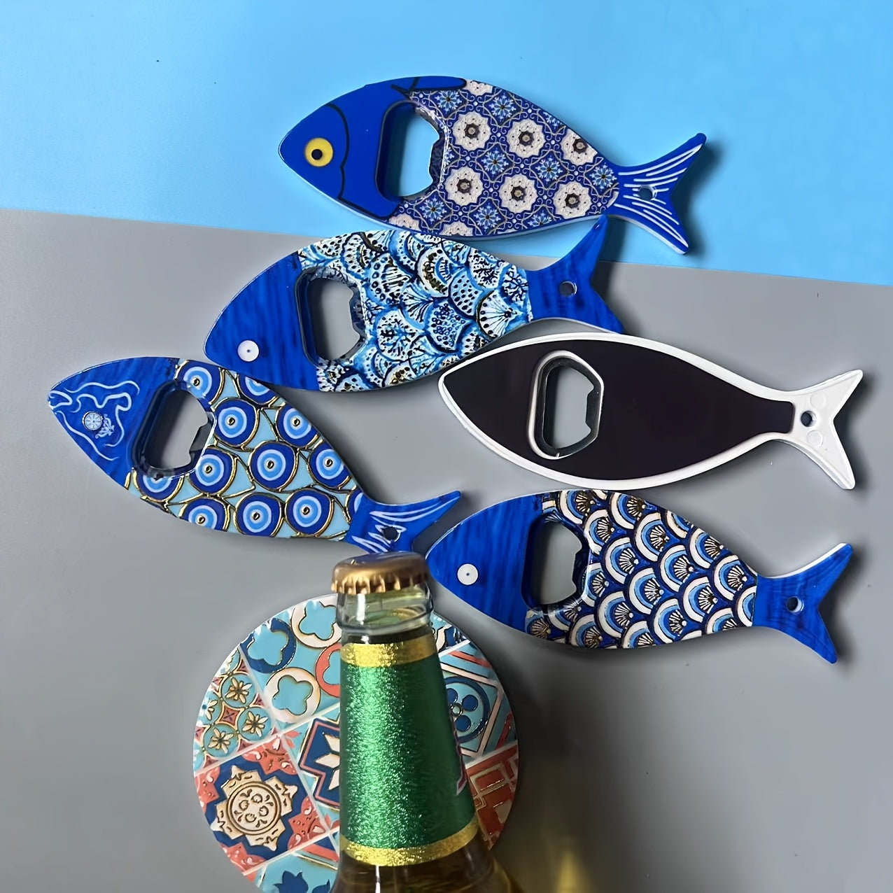 Fish-shaped cap opener with magnet for refrigerator decoration, no power required.