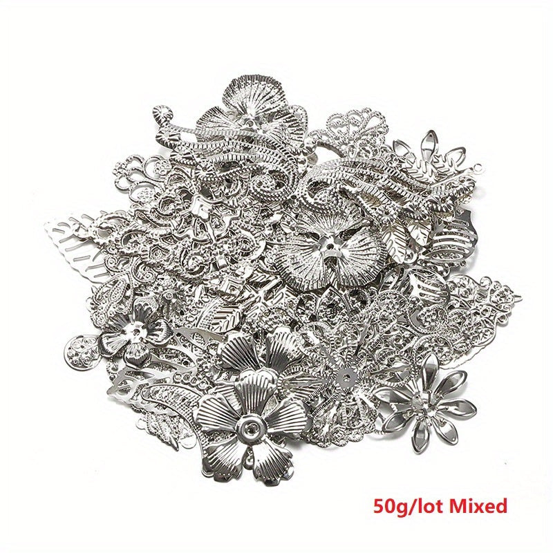 A set of 50g of white, golden, and silvery alloy charms featuring a mix of carved flower and leaf designs. Perfect for crafting pendant necklaces and other DIY jewelry projects. Get your hands on these unique and stylish supplies for making accessories.