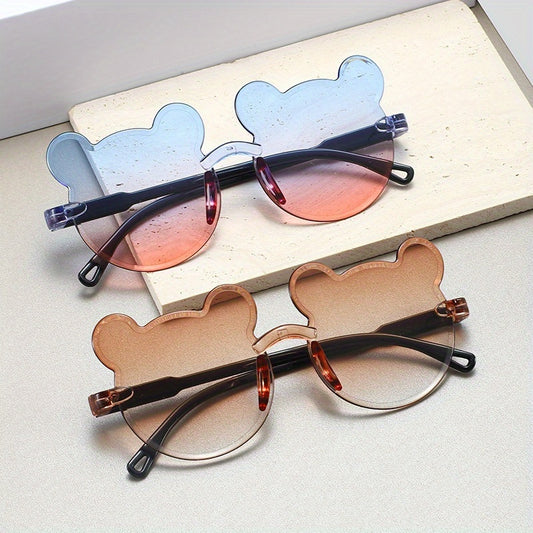 Trendy bear ear shaped glasses with transparent cartoon design and anti-glare lenses in assorted colors; ideal for parties and fashion statements.