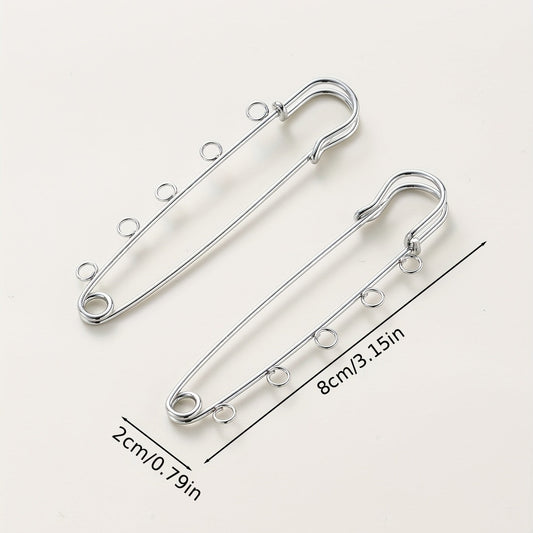 Iron safety brooch kilt pins findings accessories for jewelry making. Pack of 10 pieces measuring 80x20mm with a hole size of 3.5mm.