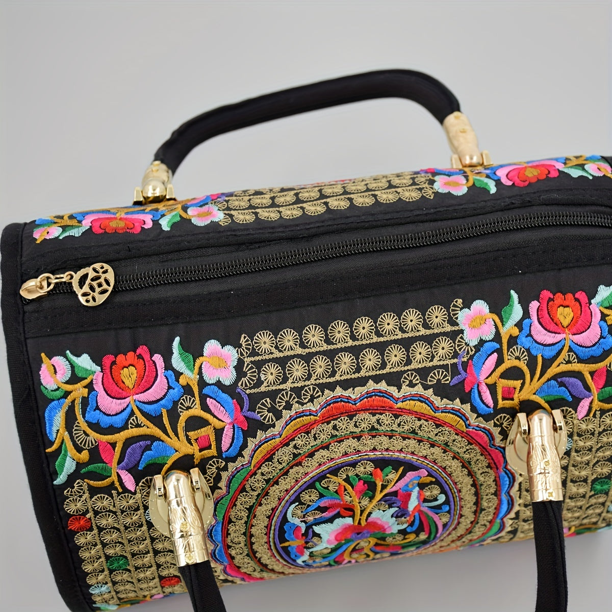 Vintage embroidered Boston bag with retro bohemian tote style for women.