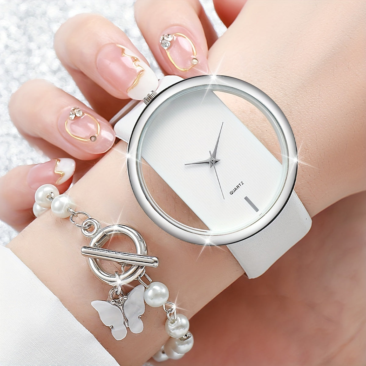 2-piece women's fashion watch set with minimalist, personality, skeleton dial. Bracelet included, case not.