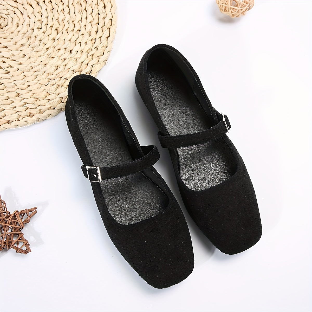 Women's comfortable solid colored flat shoes with square toe and buckle strap.