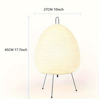 Stylish LED Japanese lantern table lamp with warm yellow light, ideal for various rooms and settings, USB powered with button control, perfect for bedroom decor.