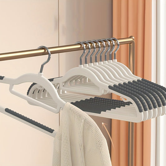 10 non-slip heavy duty clothes hangers for storage and organization in bedroom, bathroom, and home.