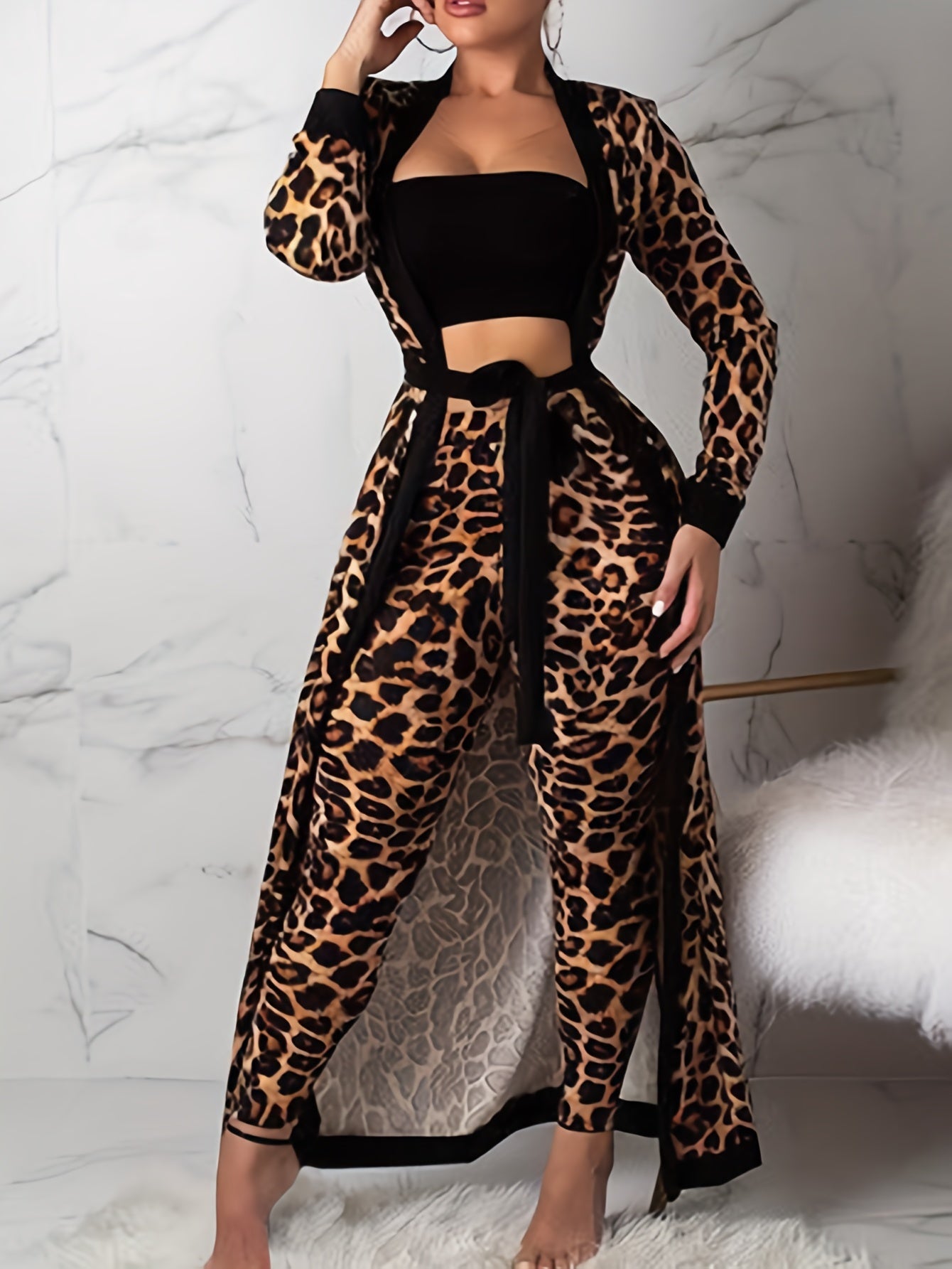 Women's loungewear set includes leopard print robe with belt, strapless crop top, and pants.