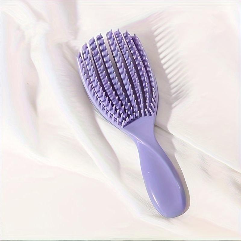 Wet and dry use shell comb with large curved fluffy style for smooth, knot-free hair. Features eight-claw massage design.