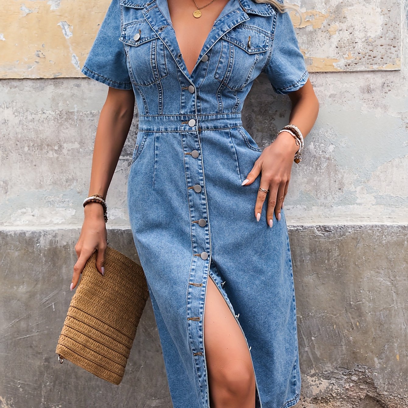 Casual denim dress for women: mid-length, short sleeves, button-up front, flap pockets, light blue.