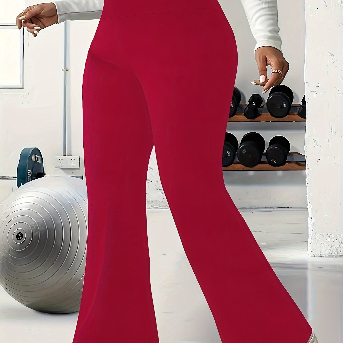 Solid flare leg pants for plus size women, suitable for spring and summer.