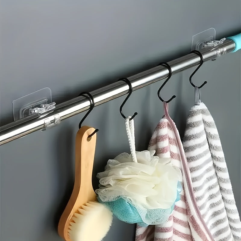 4-piece adhesive hook set for easy, damage-free hanging of curtains in kitchen and bathroom.