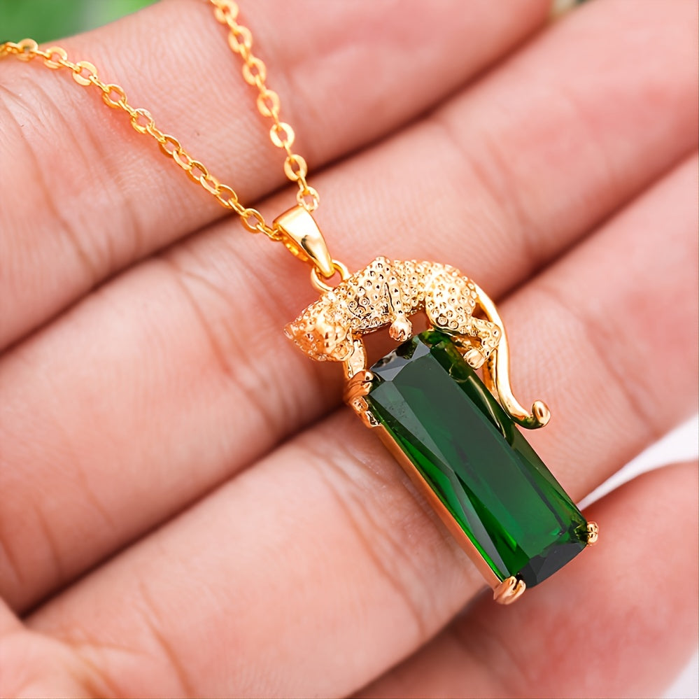 Golden plated green artificial crystal leopard pendant necklace, perfect for women who love hip hop punk style. This created emerald panther necklace makes a unique and stylish jewelry gift.